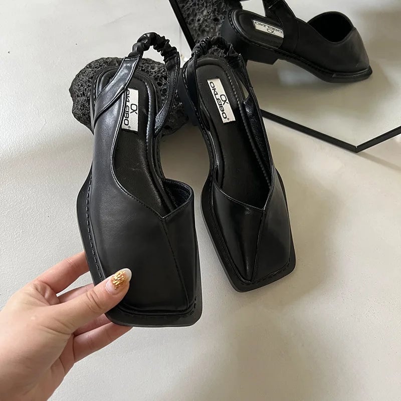 Felicity slip-on shoes in zebra print, three-quarter front angle on white background