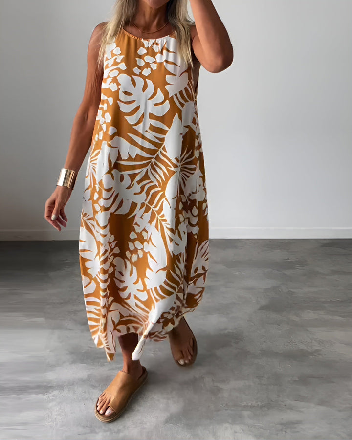 Woman wearing the Felicity sleeveless draped evening dress in green, full-length front view