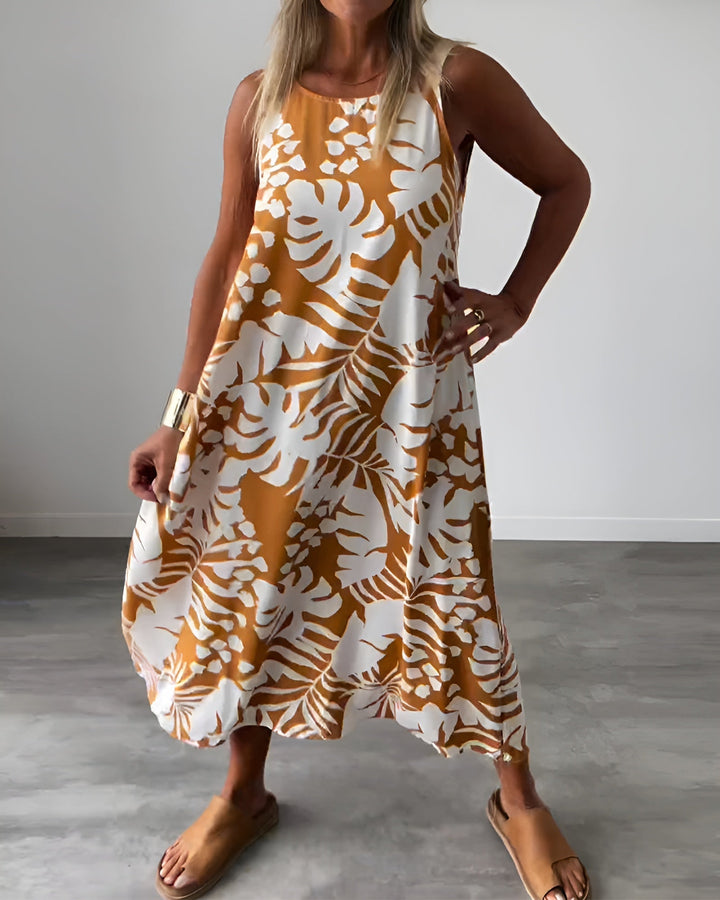 Woman wearing the Felicity sleeveless draped evening dress in blue, full-length front view