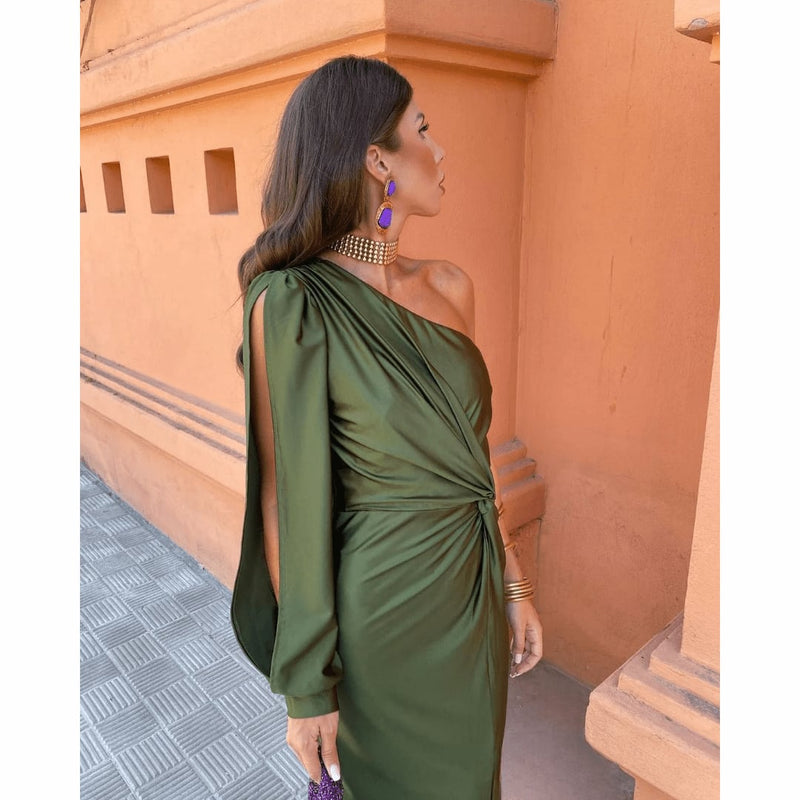 Back view of the Felicity women's evening dress in olive green highlighting the smooth, structured fit