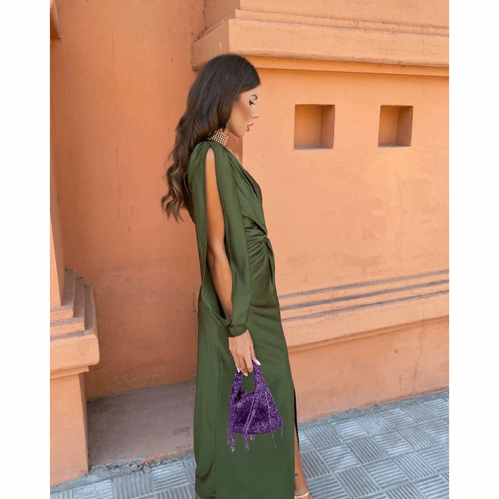 Woman wearing the Felicity wedding guest dress in lavender, full-length front view