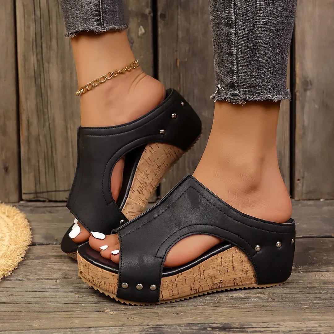 Felicity studded cork wedge sandals in black with metallic stud detail and open toe strappy design