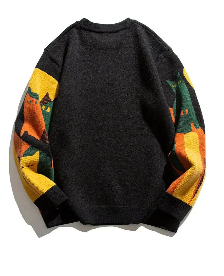 Close-up of the moonlit cat artwork on the front of the Florimay graphic sweater in beige