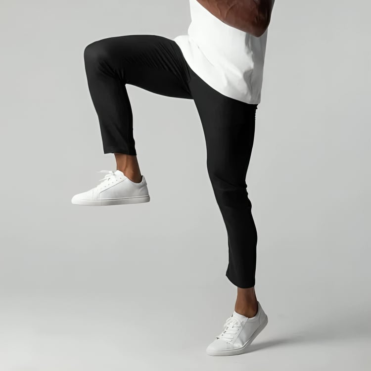 Side profile of women's stretch chino pants showing clean silhouette