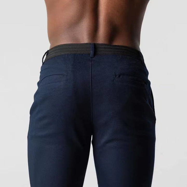 Women's chino pants in olive colorway on model