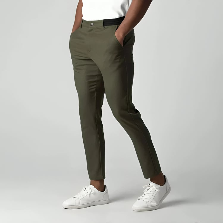 Women's chino pants in navy blue showing tailored leg cut