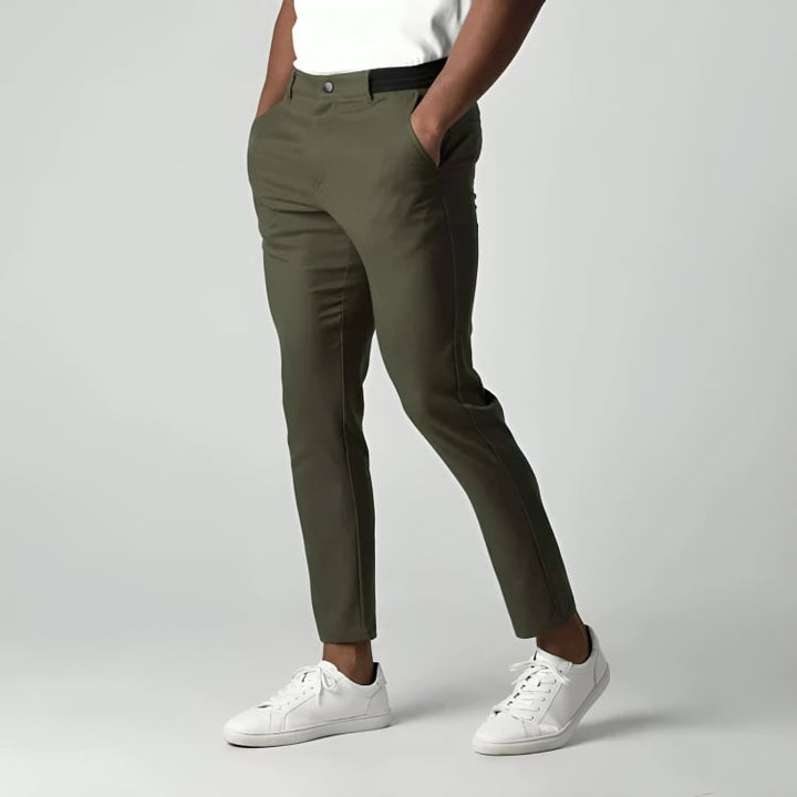 Women's chino pants in navy blue showing tailored leg cut