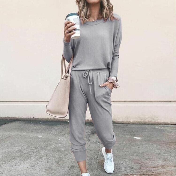 Side profile of model in the coordinated set highlighting the flattering fit and relaxed silhouette