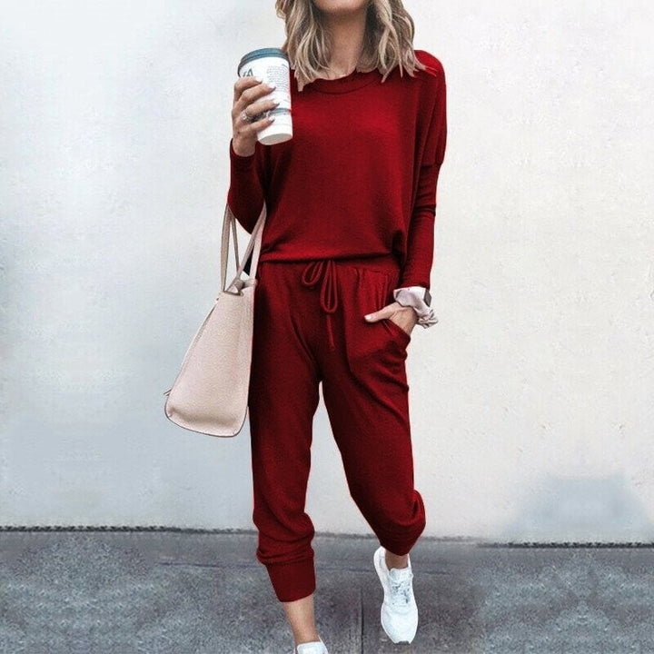 Model posing outdoors in the coordinated set, demonstrating its versatility for travel and outings