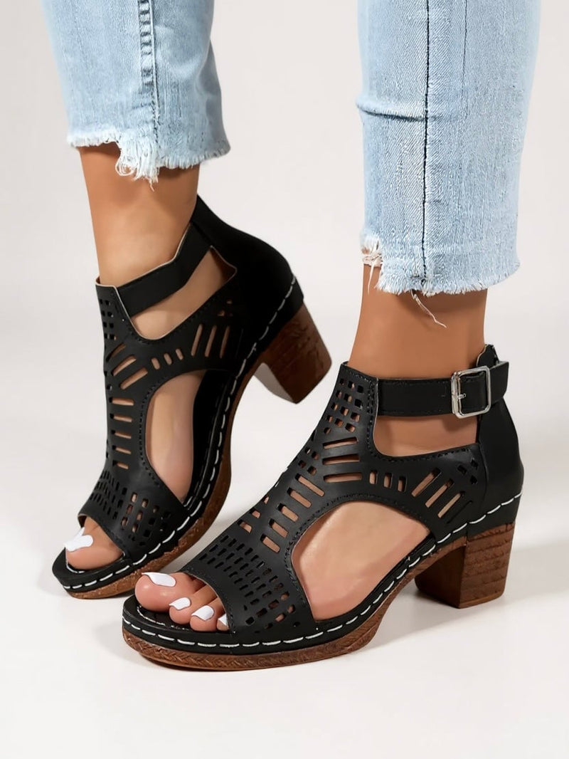 Fern cutout block heel sandals in black, front view showing cutout upper and stable heel