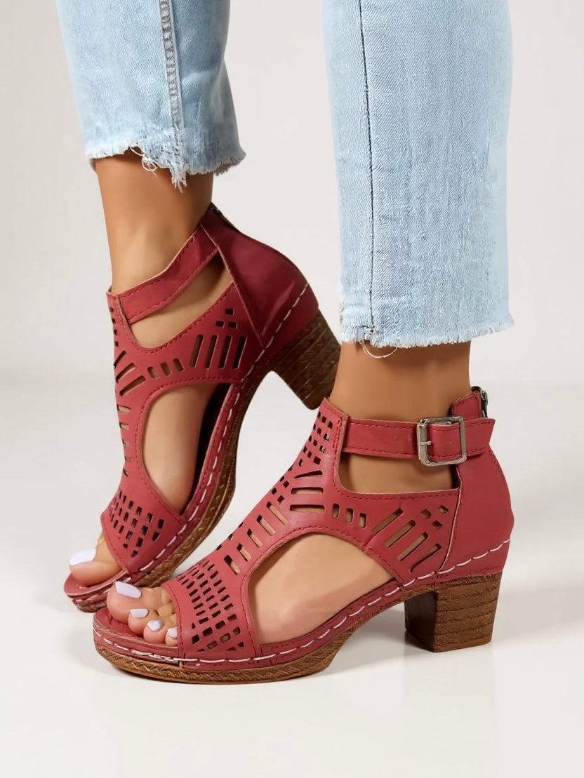 Fern cutout block heel sandals in beige, angled side view highlighting cutout detailing