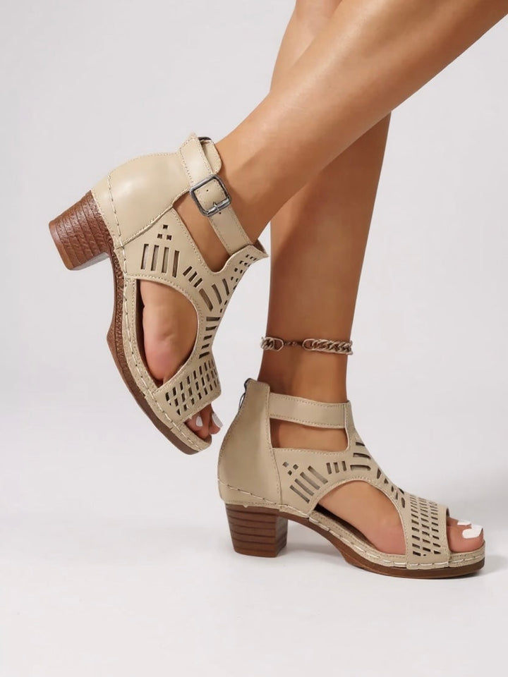 Fern cutout block heel sandals in navy blue, close-up of cushioned footbed and block heel