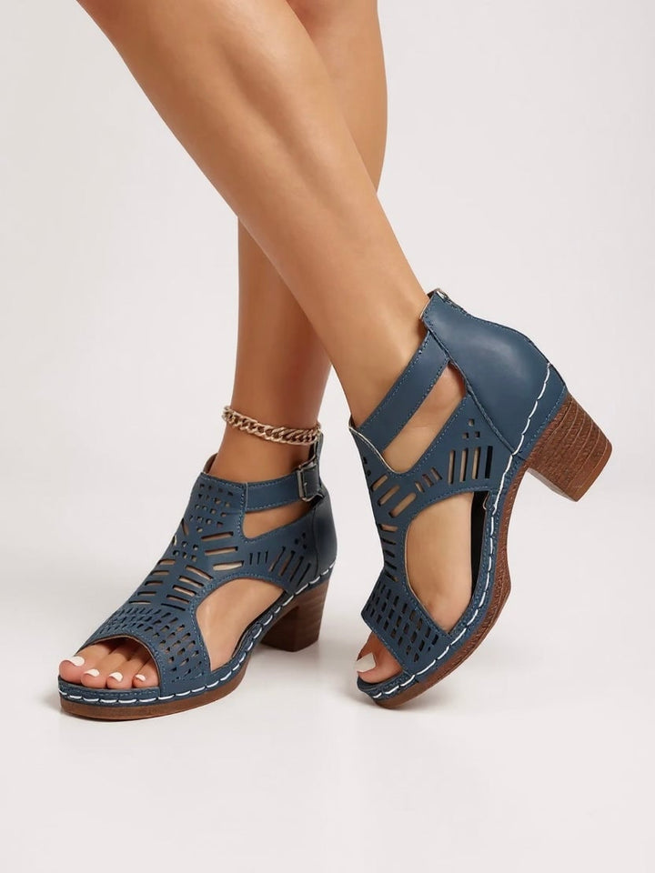 Fern cutout block heel sandals styled with tailored trousers, full-length outfit view