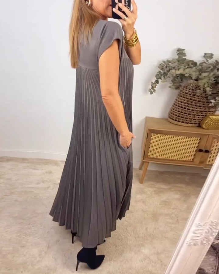 Detail shot of the pleats on the Fern maxi dress in black