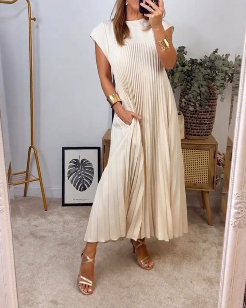 Side view of the Fern flowy maxi dress in yellow highlighting the waist definition