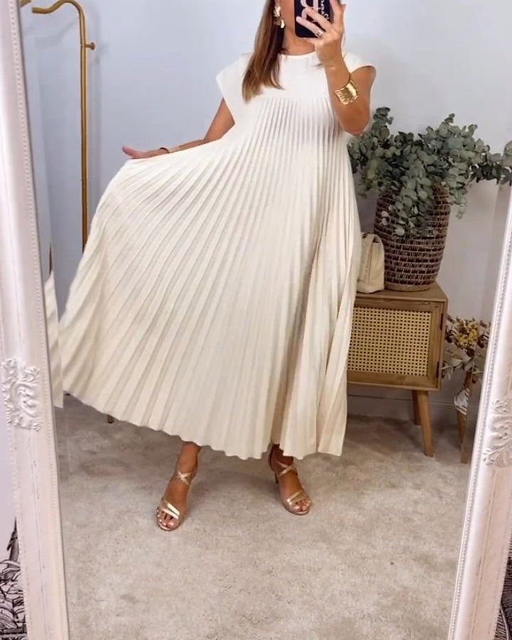 Woman in the Fern maxi dress in black, movement shot showing fabric drape