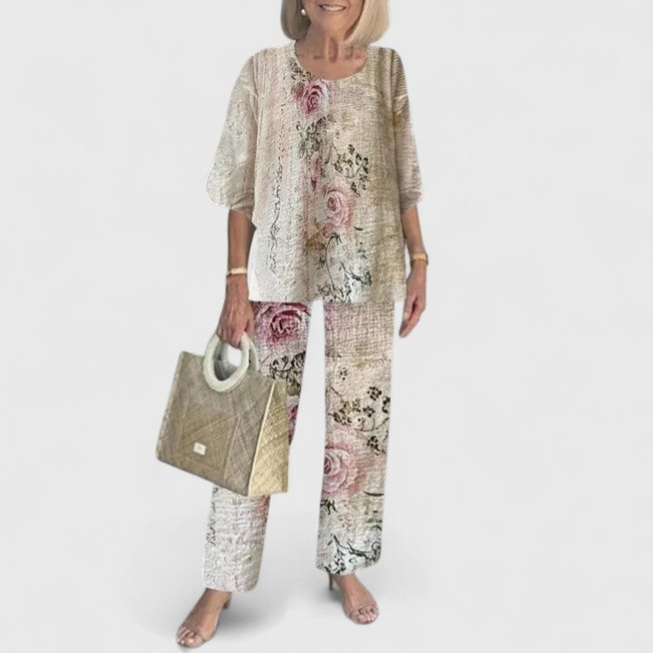 Back view of the Fern set in pink showing the relaxed cape drape of the top