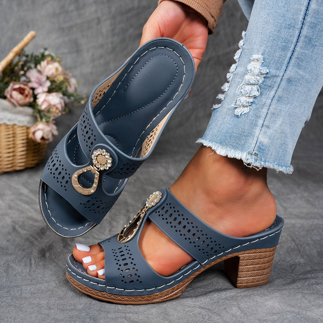 Side profile of Finley black flat sandal showing arch support sole