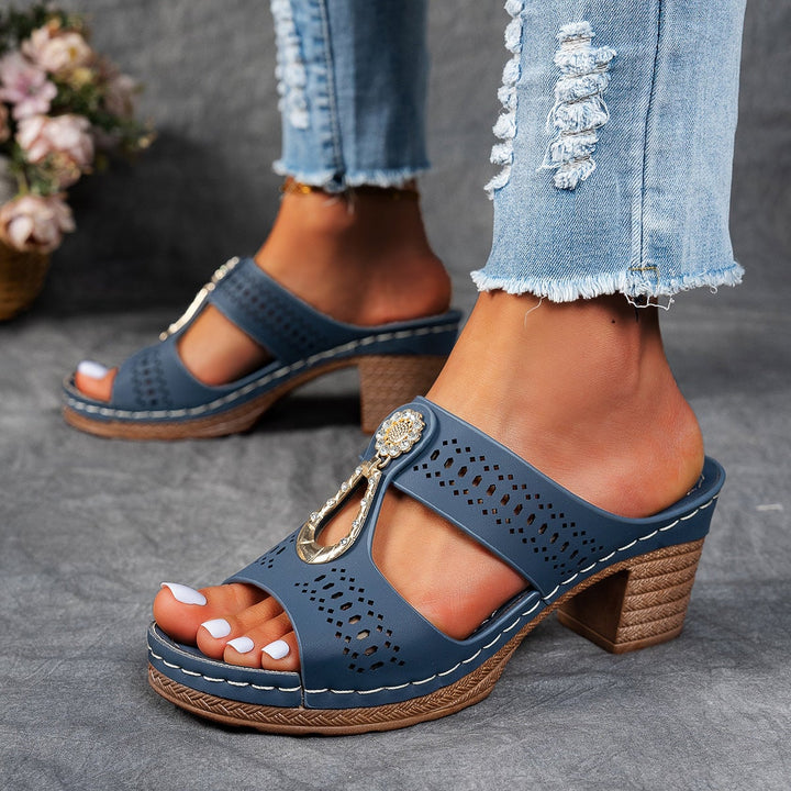 Side profile of Finley blue flat sandal showing cushioned footbed