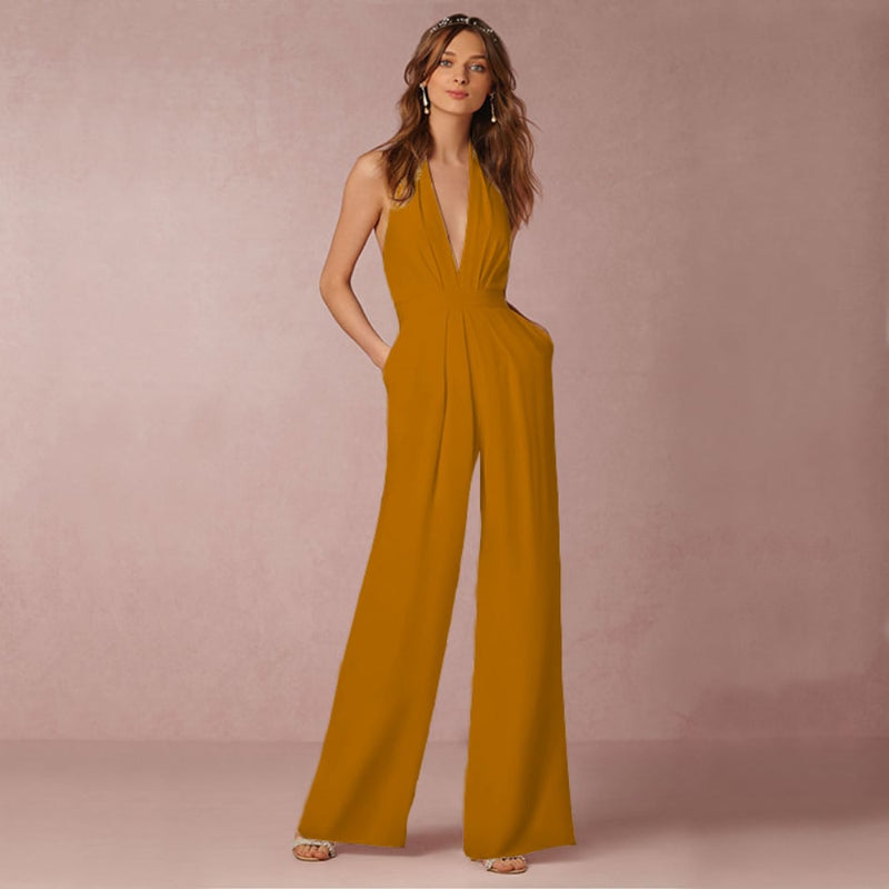 Rear view of the Fiona halter jumpsuit showing the open back detail and floor-length wide-leg trousers
