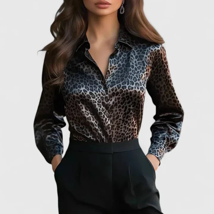 Women's leopard print long sleeve collared blouse with button front closure, shown in pink