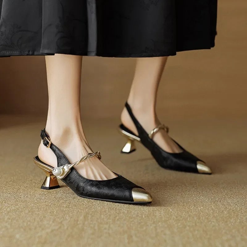 Fleur kitten heel pumps in beige styled with tailored trousers for an elegant occasion