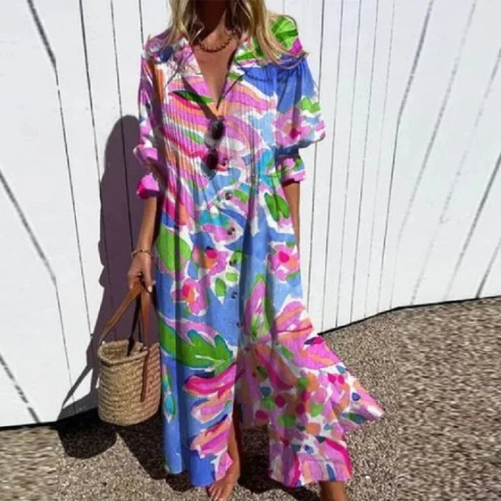 Front view of the Fleuria flowy dress in yellow, styled with sandals for a casual summer look
