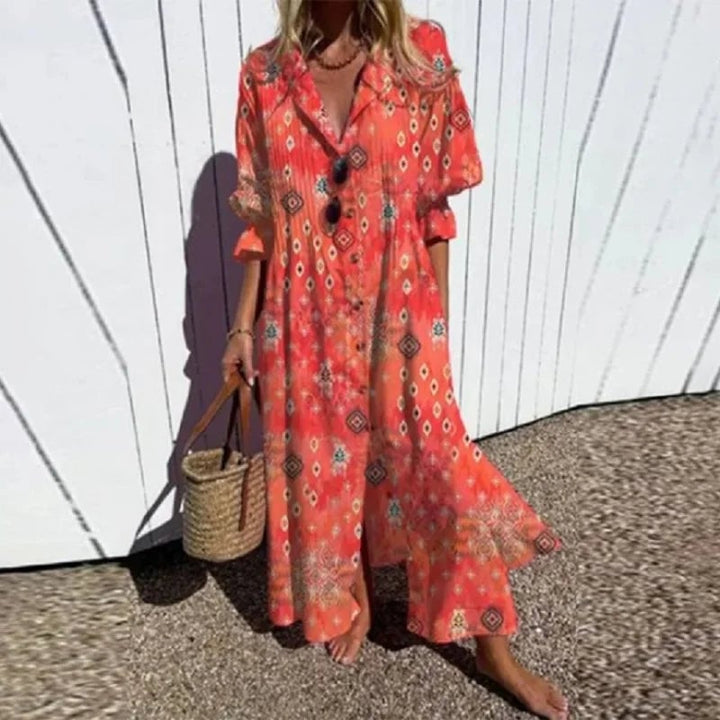 Model wearing the Fleuria boho dress in pink, showcasing the flowing silhouette and feminine fit