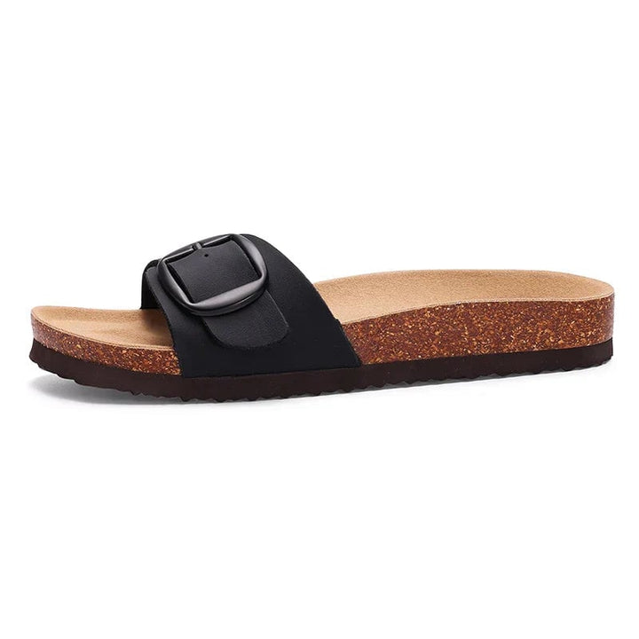 Flora flat sandals in purple paired with wide-leg trousers, lifestyle shot