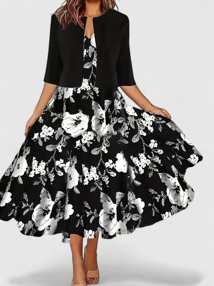 Flora floral midi dress in blue, close-up of keyhole neckline and button-front bodice detail