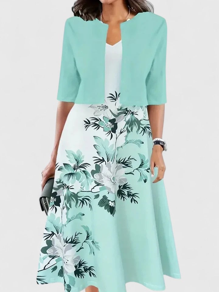 Flora floral midi dress in black colorway, front view showing two-tone A-line silhouette