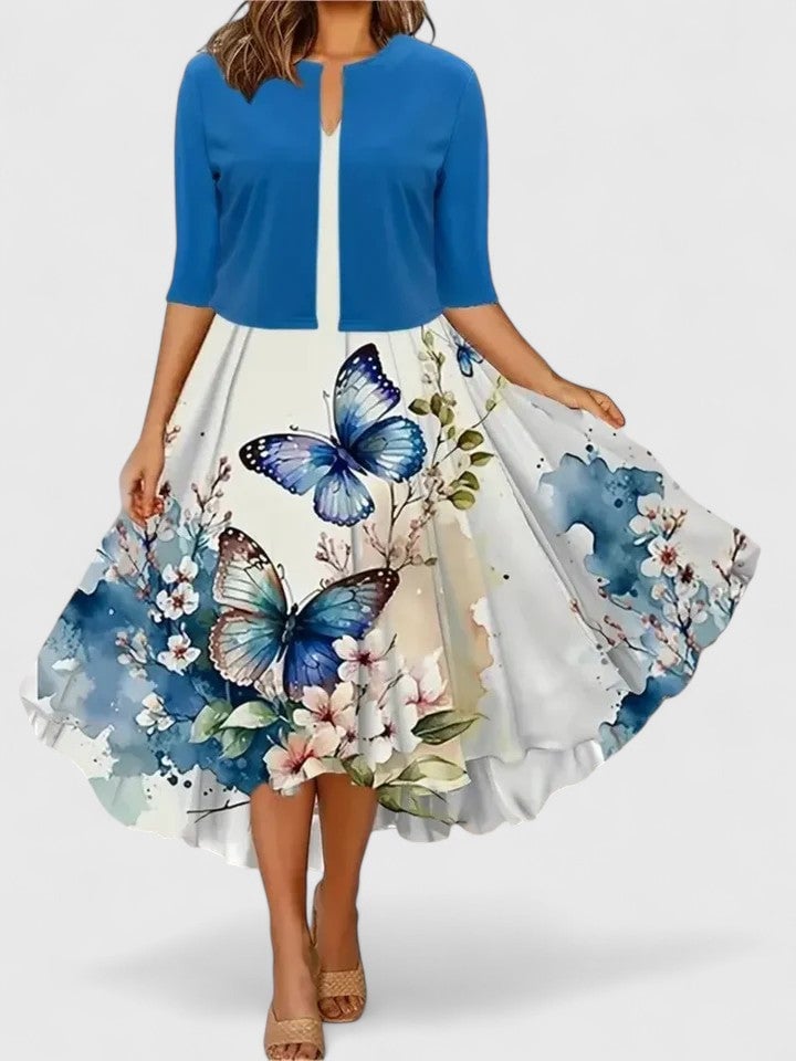 Flora floral midi dress styled with heeled sandals for a spring occasion look