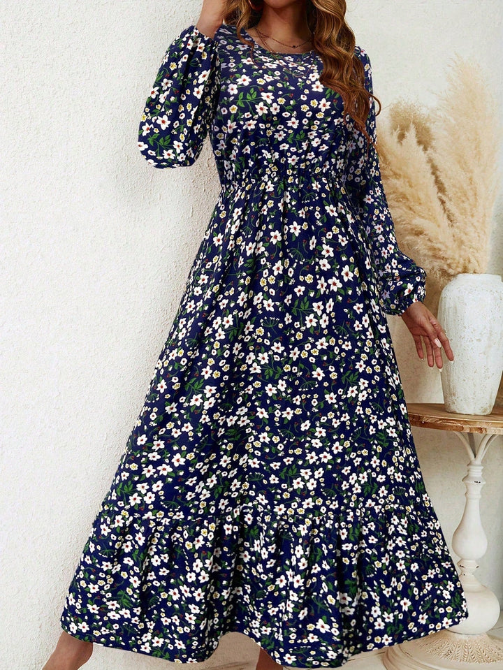 Close-up of the gathered bishop sleeve wrist cuff detail on the Flora maxi dress