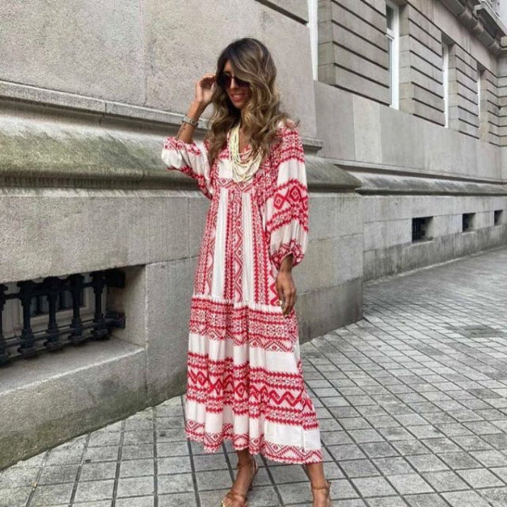 Flora boho maxi dress in blue showing sleeve length and fitted elbow detail