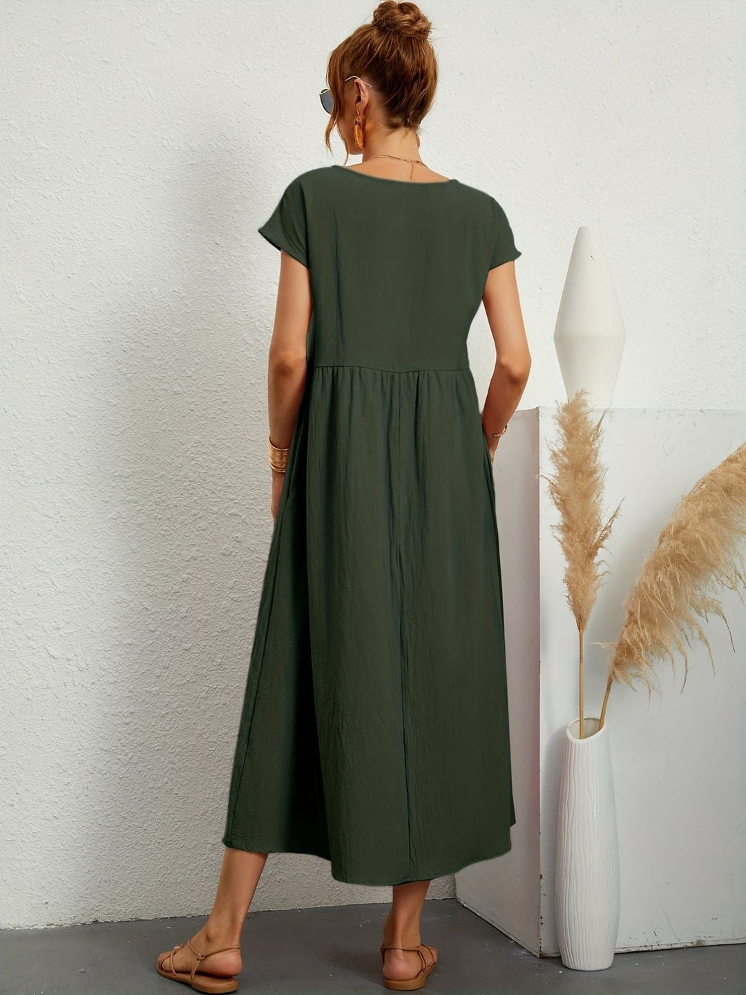 Front view of the Florence lightweight dress showing refined neckline and airy fabric