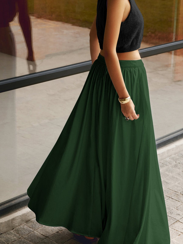 Side view of Florence black maxi skirt with side pocket detail
