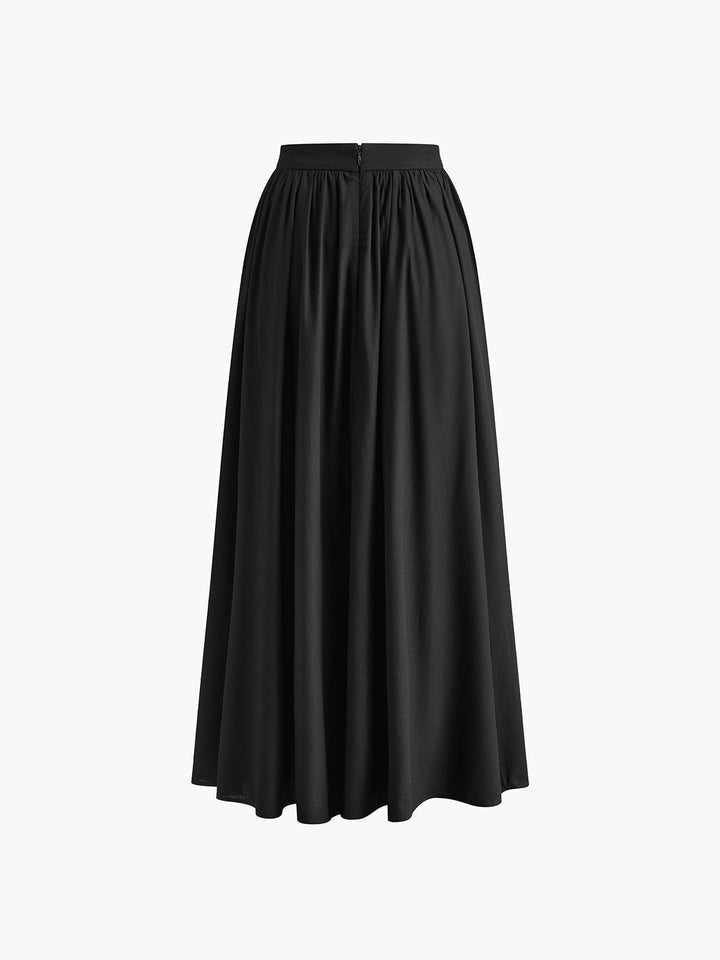 Close-up of soft pleating and waistband on Florence green maxi skirt