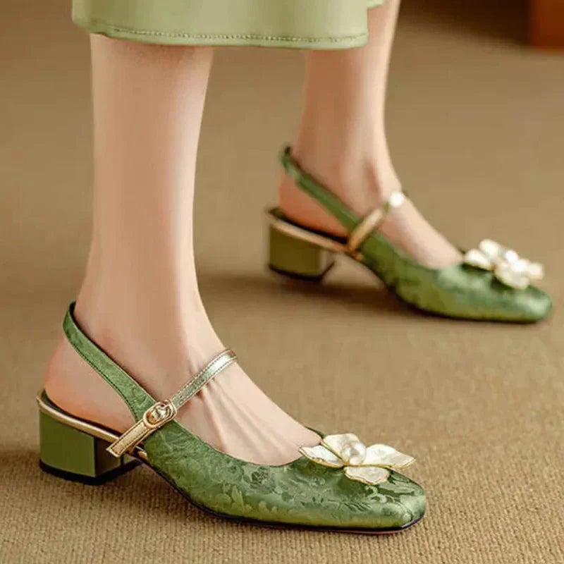 Florine floral slingback pump in green, side profile showing mid-height block heel and adjustable strap