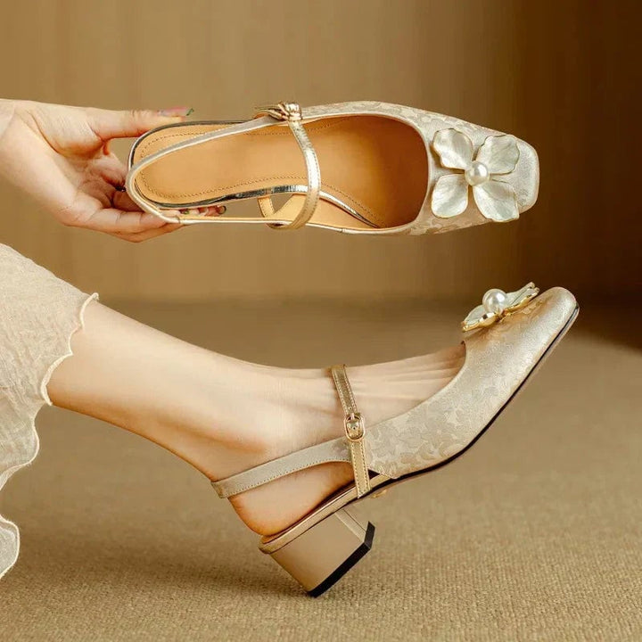 Florine floral slingback pump in beige, rear view highlighting adjustable slingback closure