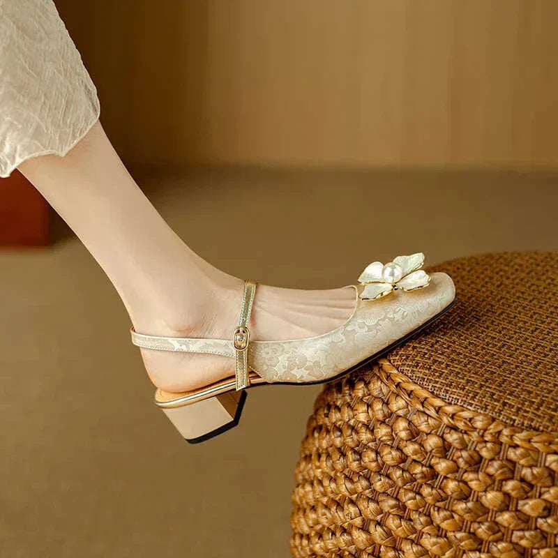 Florine slingback pump sole and heel detail showing stable block heel construction