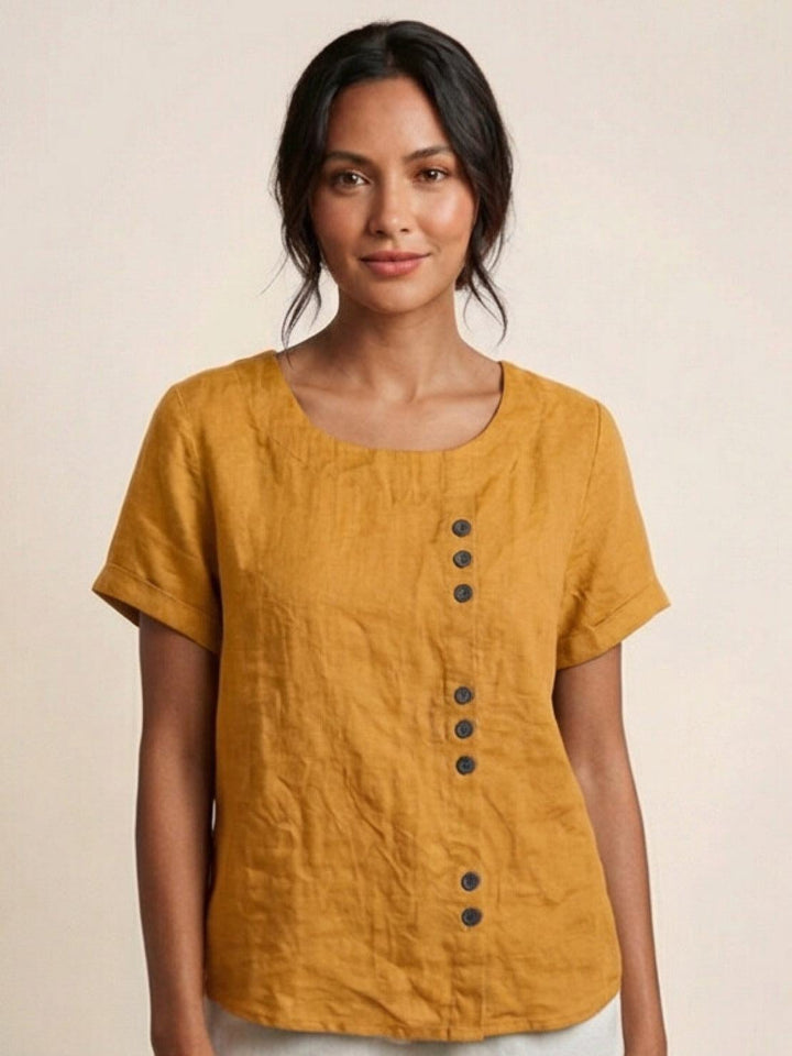 Side view of Foreen relaxed top in Deep Teal with dropped shoulder detail