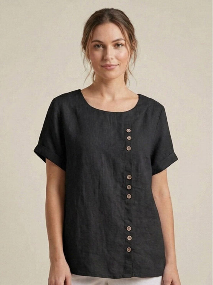 Model wearing Foreen top in Deep Teal knotted at the hem