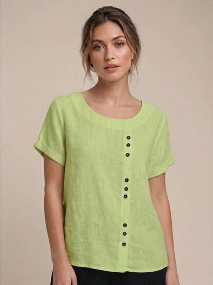 Close-up of cuffed short sleeves on Foreen top in Coffee Brown