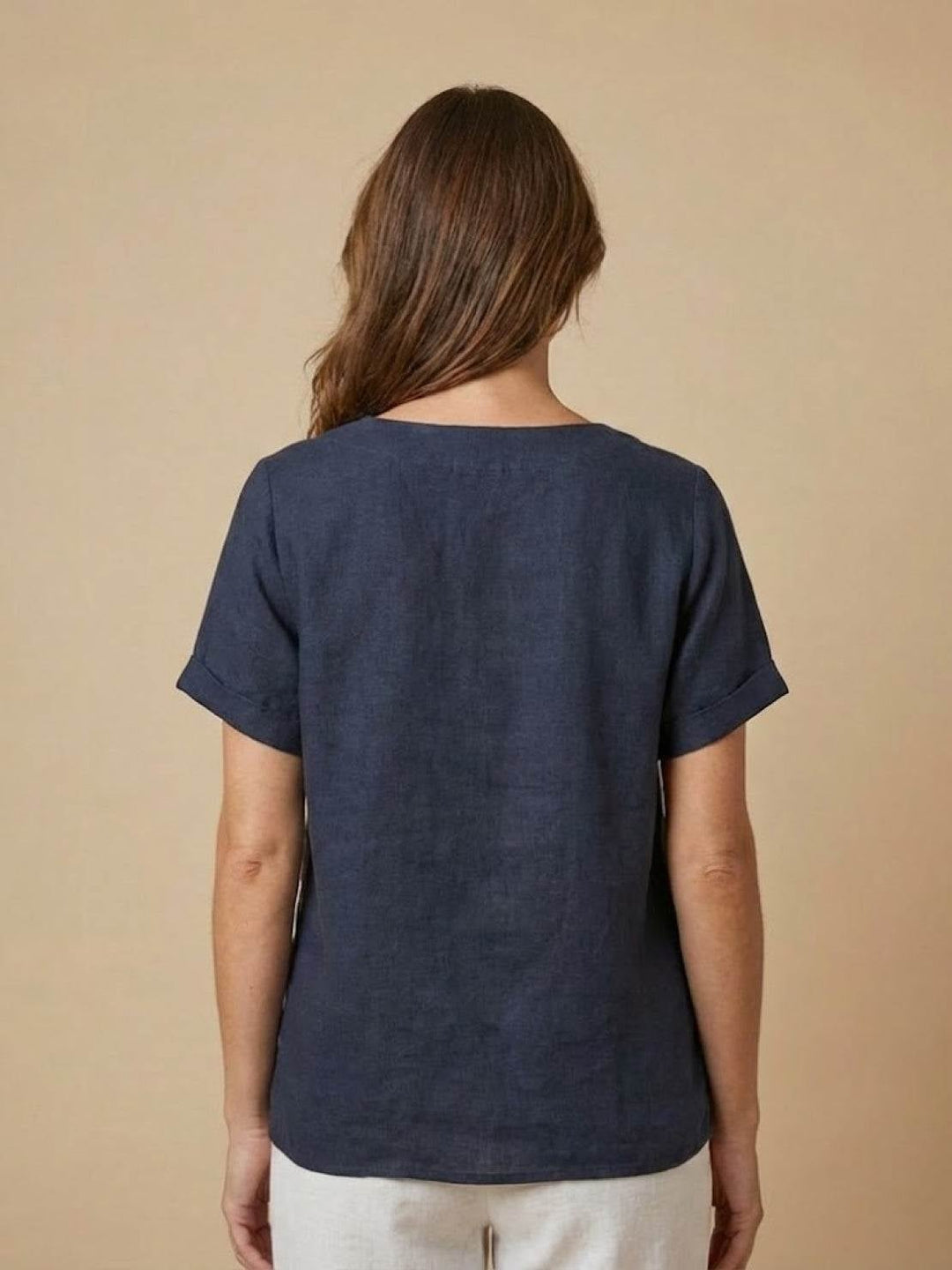 Front view of Foreen scoop neck top in White on model