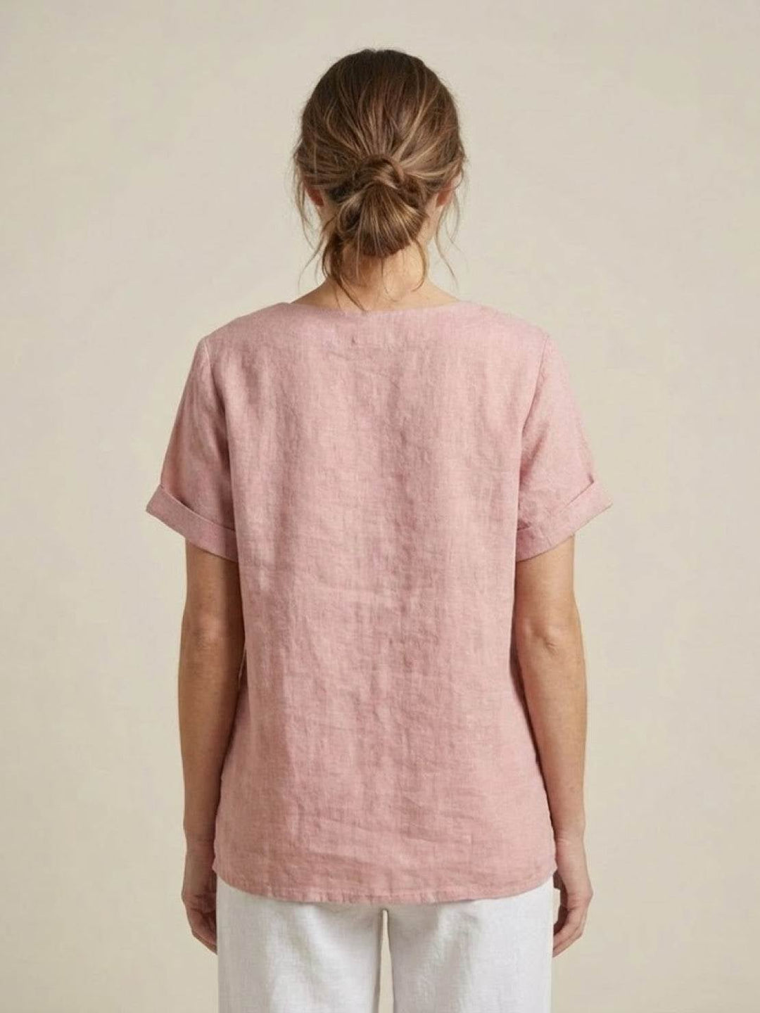 Front view of Foreen short sleeve top in Orange
