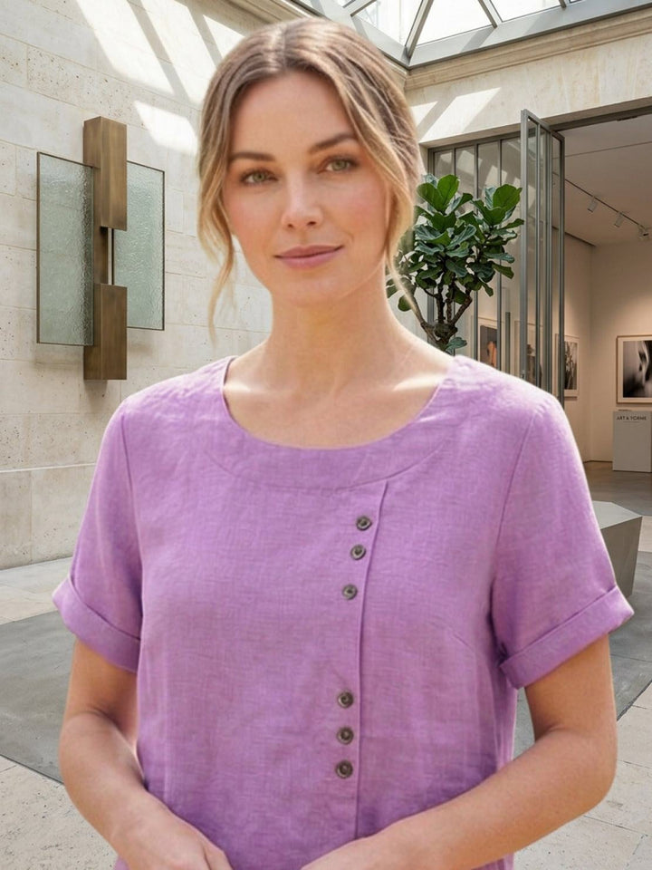 Model wearing Foreen short sleeve top in White from side angle