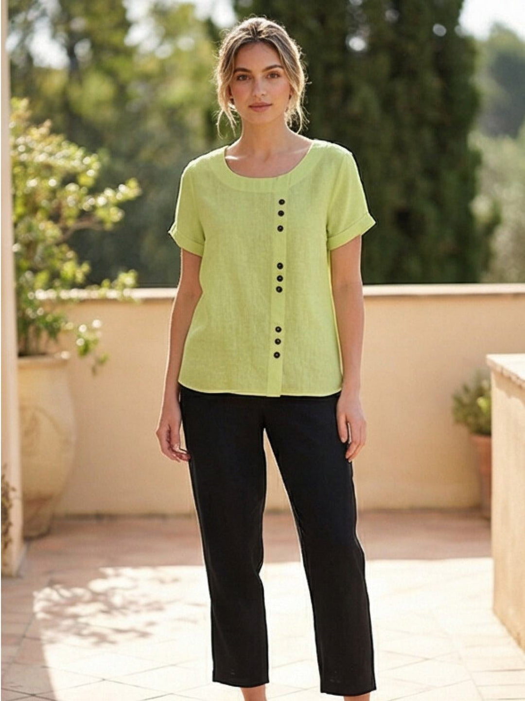 Model wearing Foreen button detail top in White from front showing full length