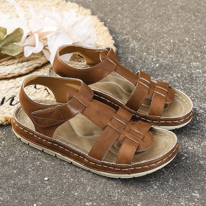 Foxglove sandals in brown, side view showing cushioned sole