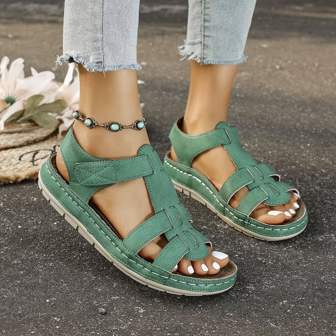 Close-up of Foxglove sandal insole in brown showing plush cushioning