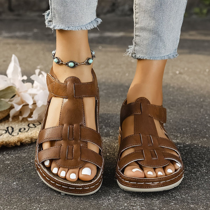 Foxglove sandals in coffee worn on foot showing relaxed elegant style